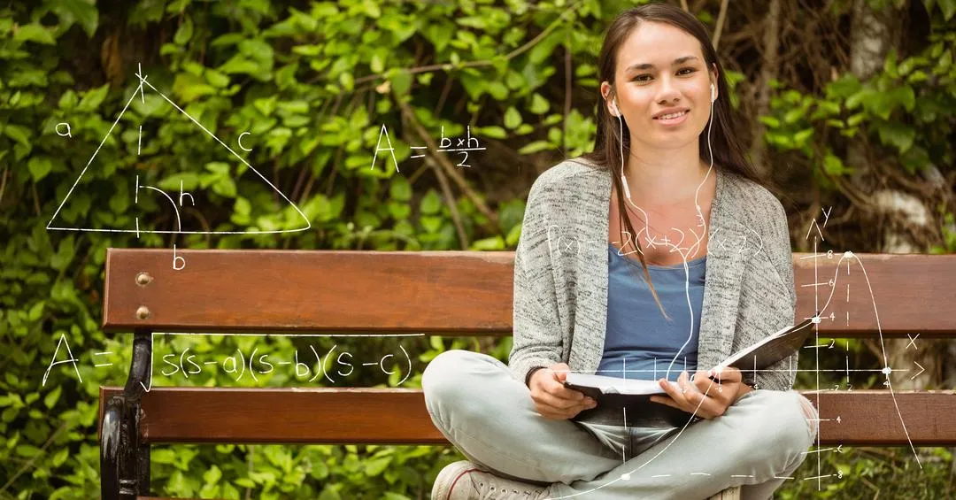 Image of a teenage girl sitting on a bench with a book in her hands and smiling into the camera - Topics and ideas for blogs that will inspire you and keep your readers engaged - Image