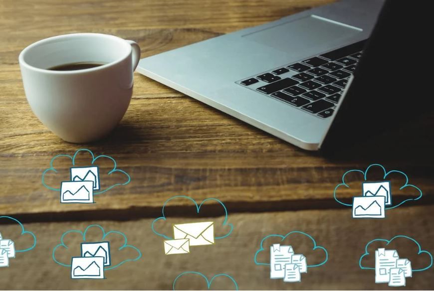 Work desk with laptop and email notifications - Learn about five essential elements of an effective email newsletter - Image