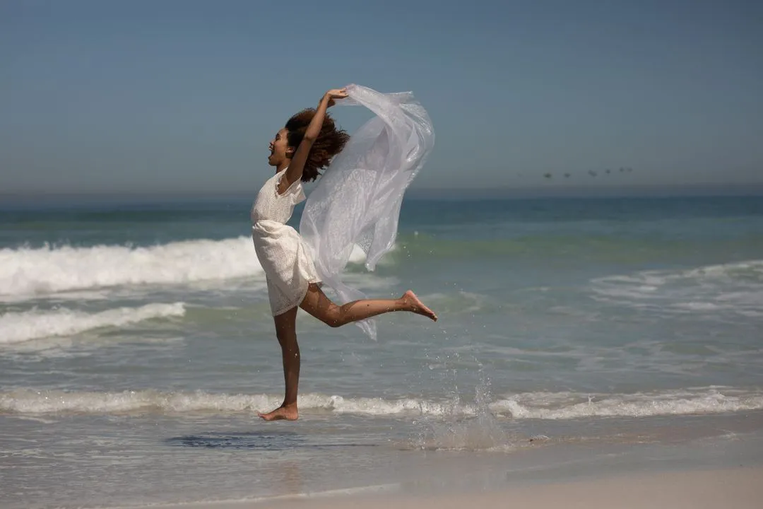 Image of a kid jumping around at the beach - The beginner's guide to YouTube marketing, how to increase subscribers quickly - Image