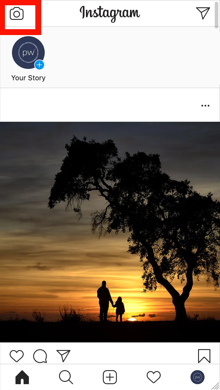 Mobile Instagram View with camera button for stories highlighted in red - A complete beginner's guide on how to post on Instagram from a PC or Mac - Image