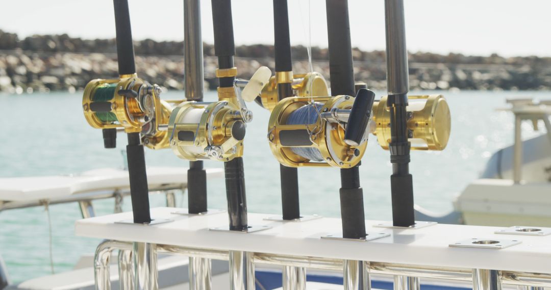 Close up detail of fishing rods standing up on a boat from Pikwizard