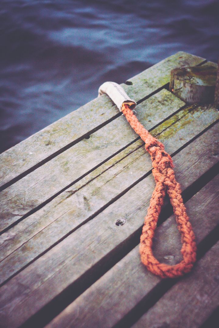 a rope tied to a wooden board - Free Images, Stock Photos and Pictures on Pikwizard.com
