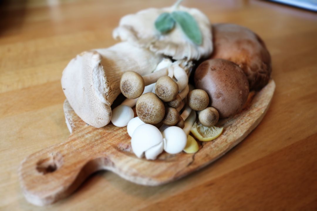 a cutting board with various foods from Pikwizard