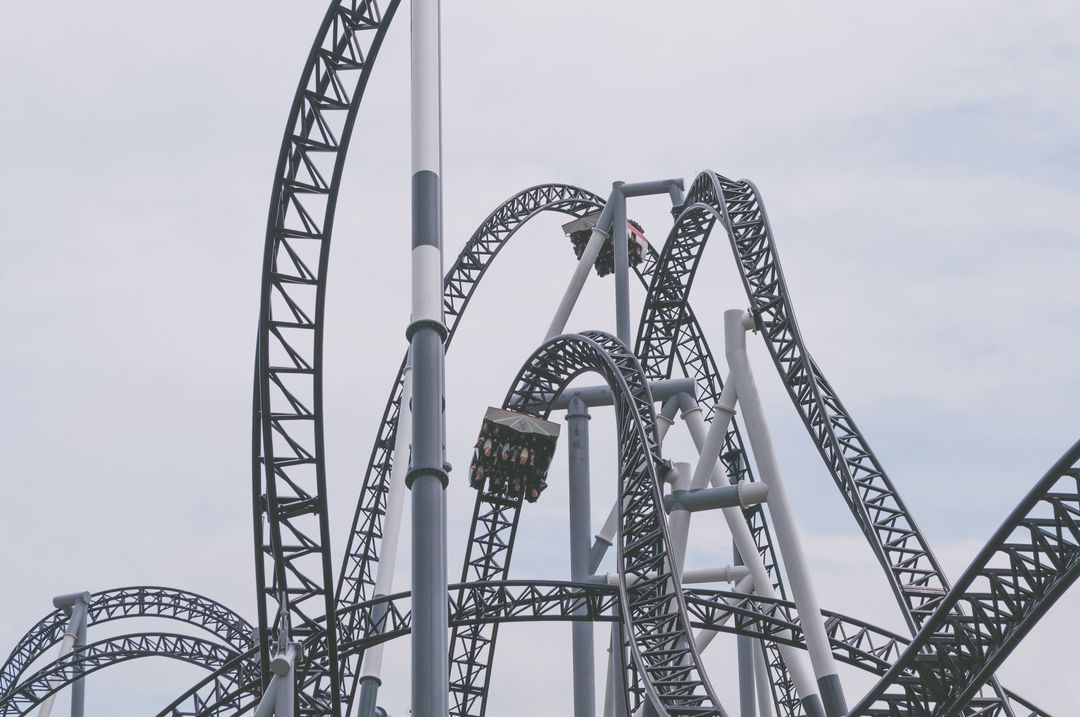 a roller coaster in an amusement park - Free Images, Stock Photos and Pictures on Pikwizard.com