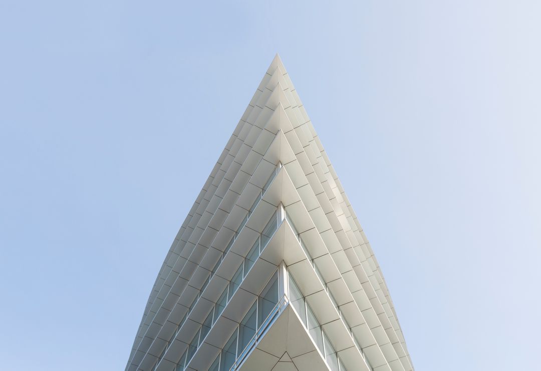 a building with a triangular shaped roof - Free Images, Stock Photos and Pictures on Pikwizard.com