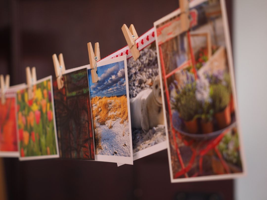 Image of Printed Pictures Hanging on a line