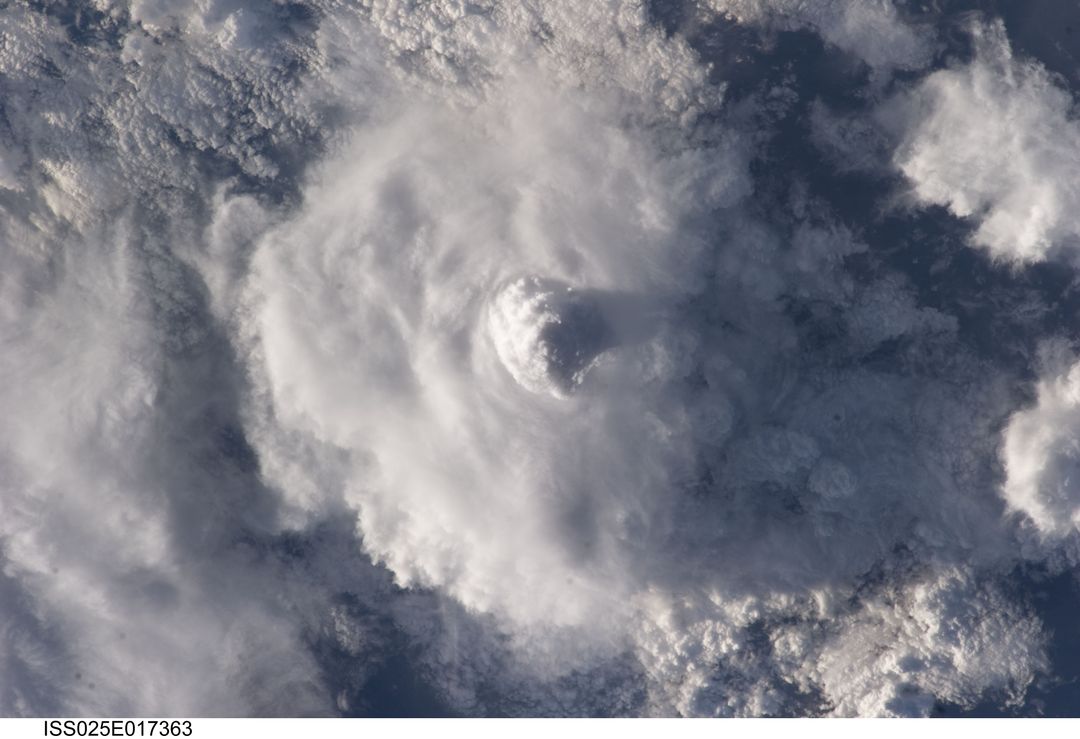 a storm cloud from space - Free Images, Stock Photos and Pictures on Pikwizard.com