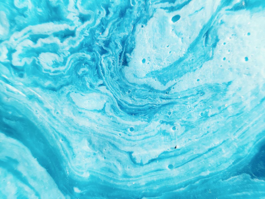 Image of a Swirling Blue Liquid Foam Background