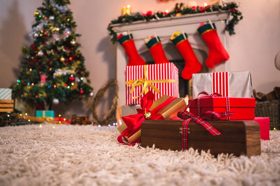 Image of a Christmas Tree with Presents Near the Fireplace