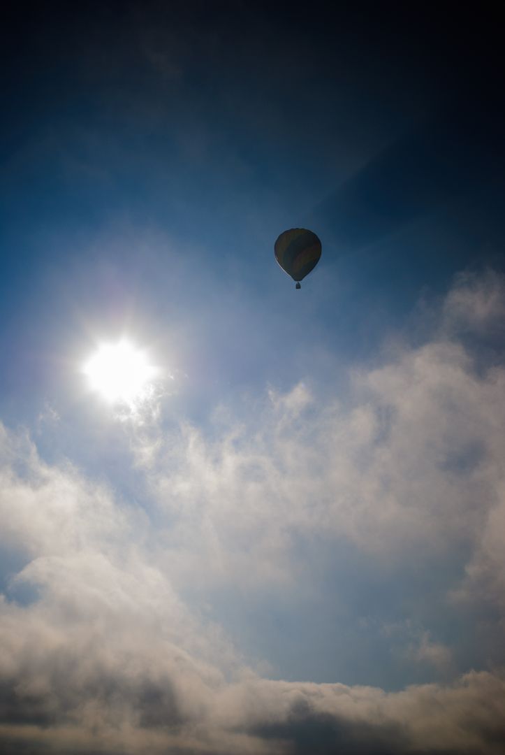 a hot air balloon flying in the sky - Free Images, Stock Photos and Pictures on Pikwizard.com