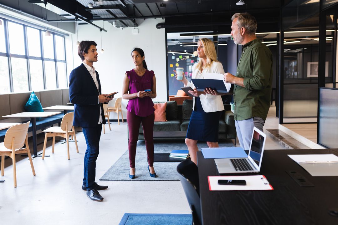 Image of a group of people planning at a business meeting - The concept and application of the 'hero image' in web design - Image