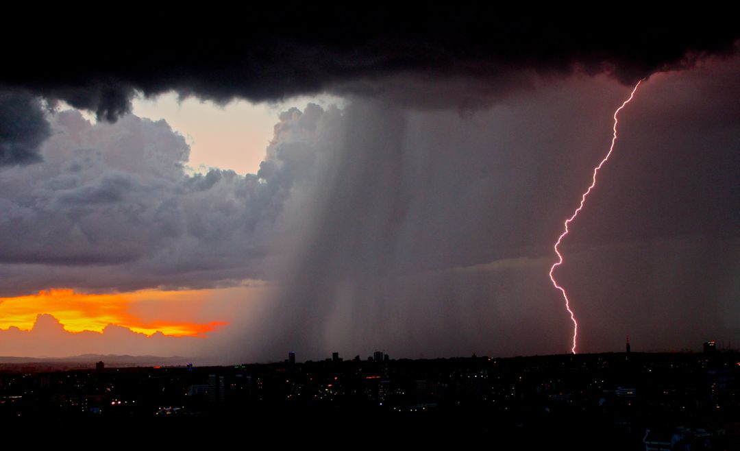 a lightning bolt striking through the clouds - Free Images, Stock Photos and Pictures on Pikwizard.com