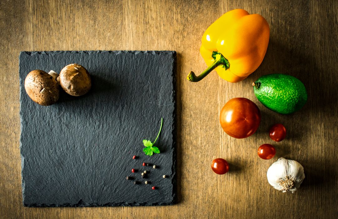 a black slate board with vegetables and spices - Free Images, Stock Photos and Pictures on Pikwizard.com