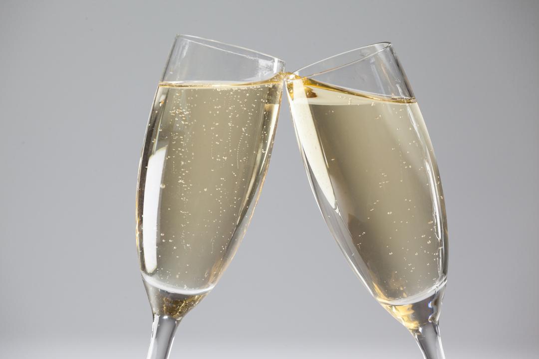 Image of two glasses of champagne clashing - A selection of images from the PikWizard team on the eve of the New Year - Image