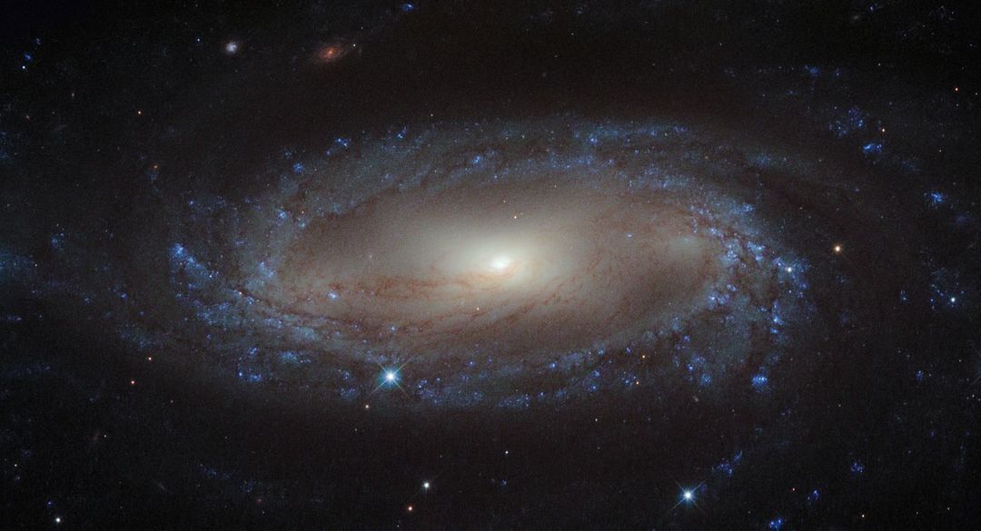 Hubble Catches a Spiral in the Air Pump - Free Images, Stock Photos and Pictures on Pikwizard.com