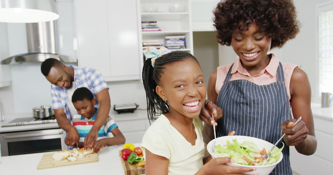 Free Photo  African american mother and son cooking together in the kitchen