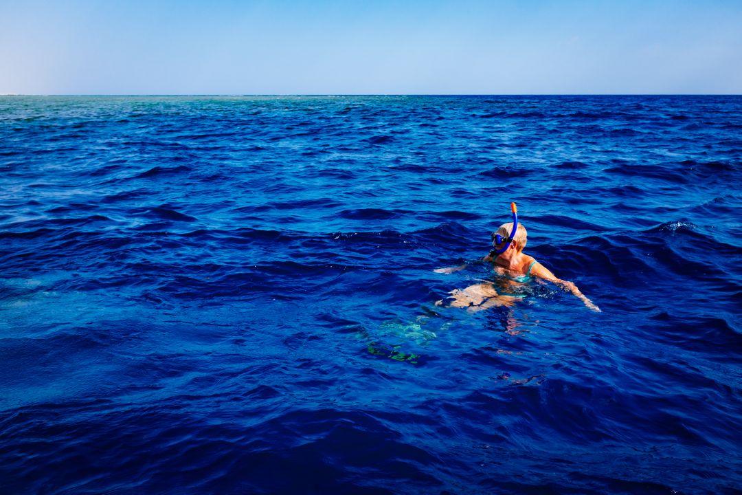 Image of a Person who Is Diving in the Sea