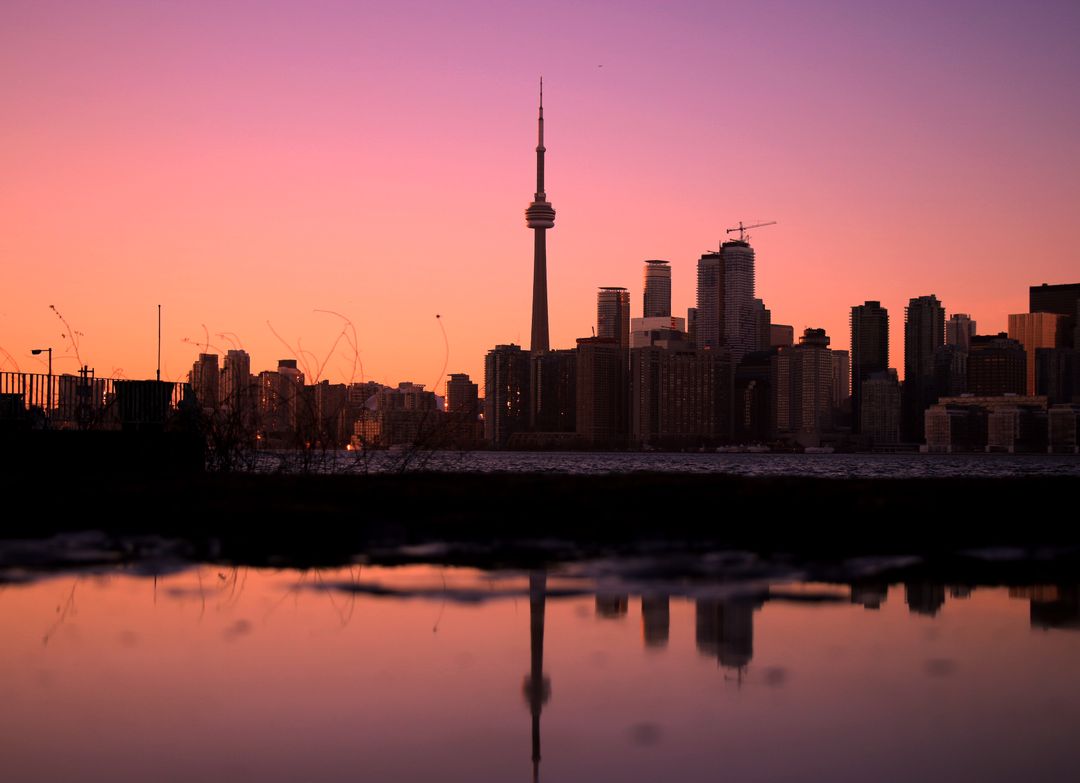 the toronto skyline at sunset - Free Images, Stock Photos and Pictures on Pikwizard.com