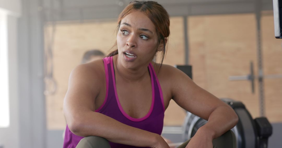 Girl wearing fashion sports wear in gym Stock Photo