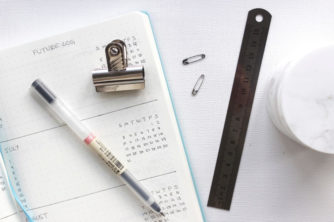 Image of a Planner and a Pencil