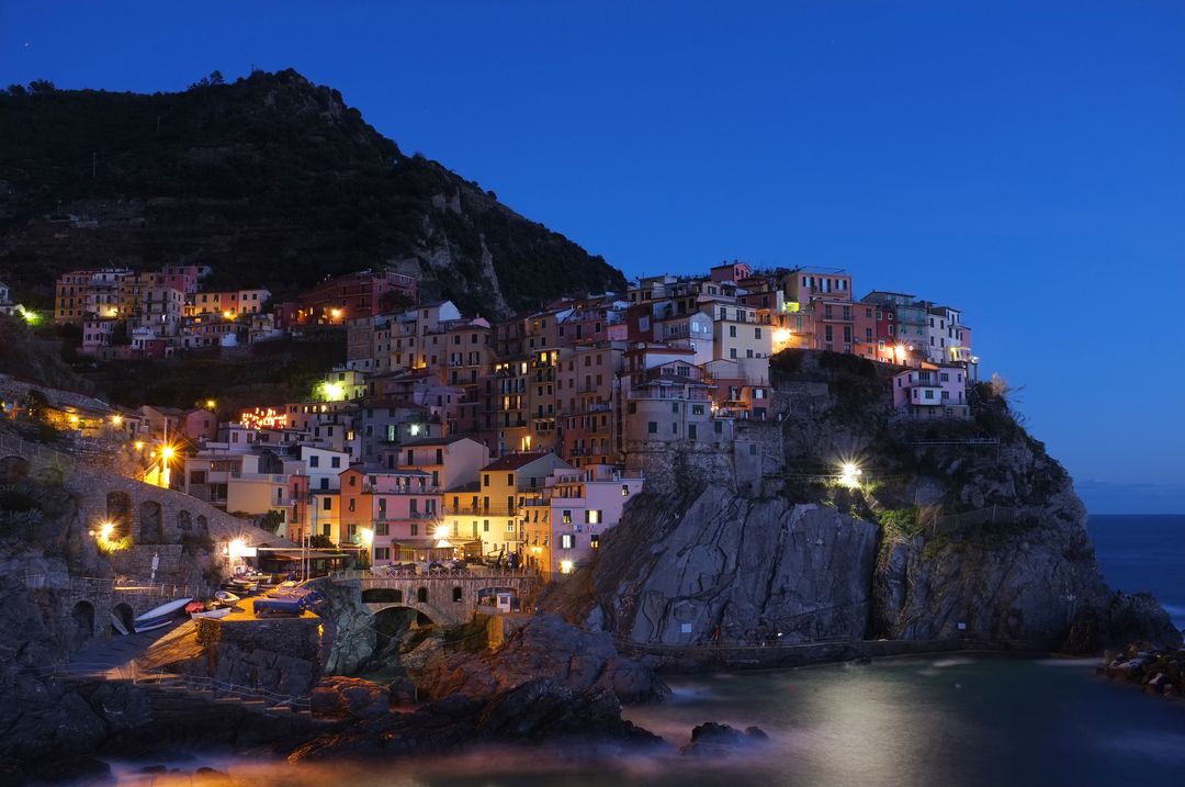 Image of an Italian village by the bay - What to write in the About section of your travel blog - Image