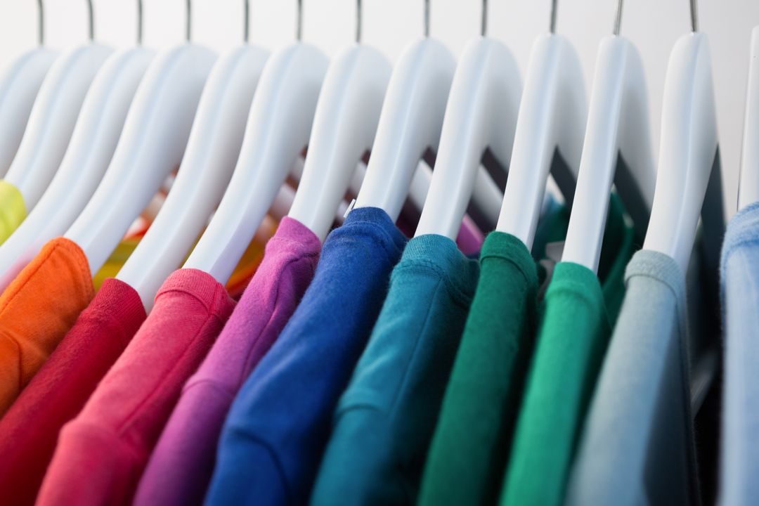 Image of Colorful Shirts on Clothes Hangers