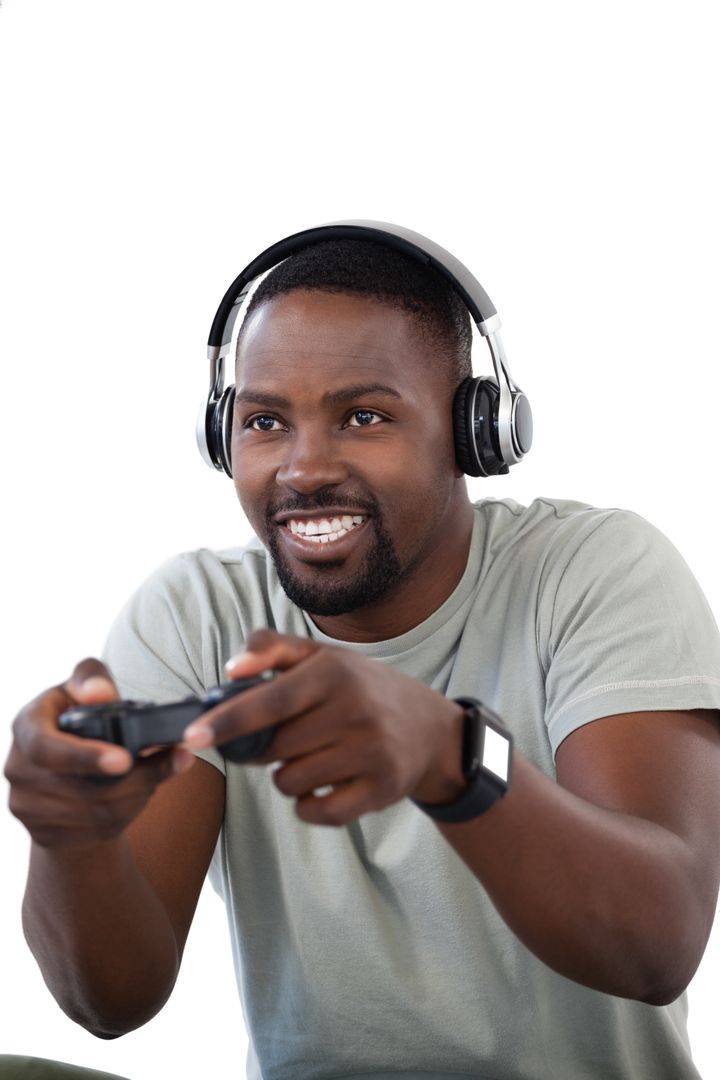 Man playing video game against white background from Pikwizard