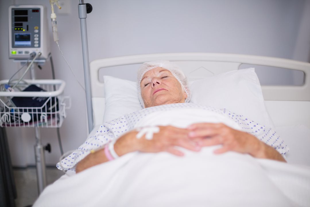 woman sick in hospital bed