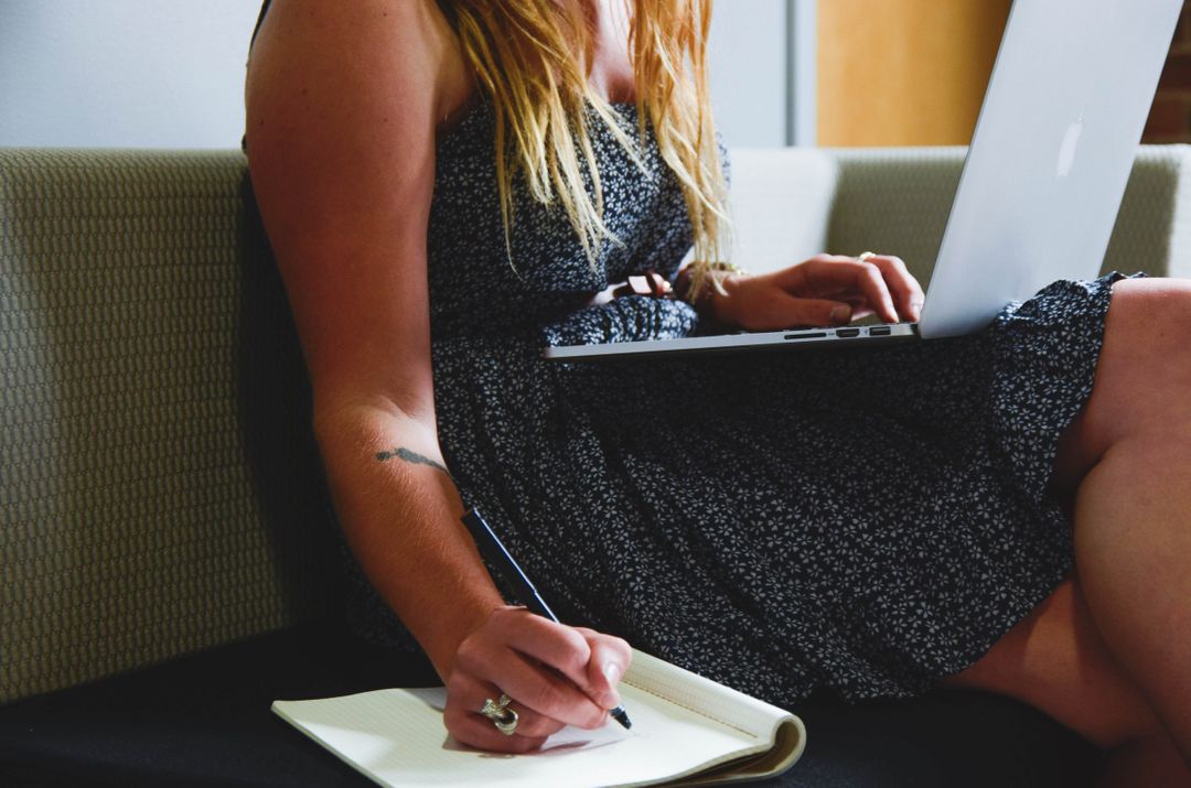 Image of a woman on her laptop taking notes - Top relevant social media trends you should know - Image