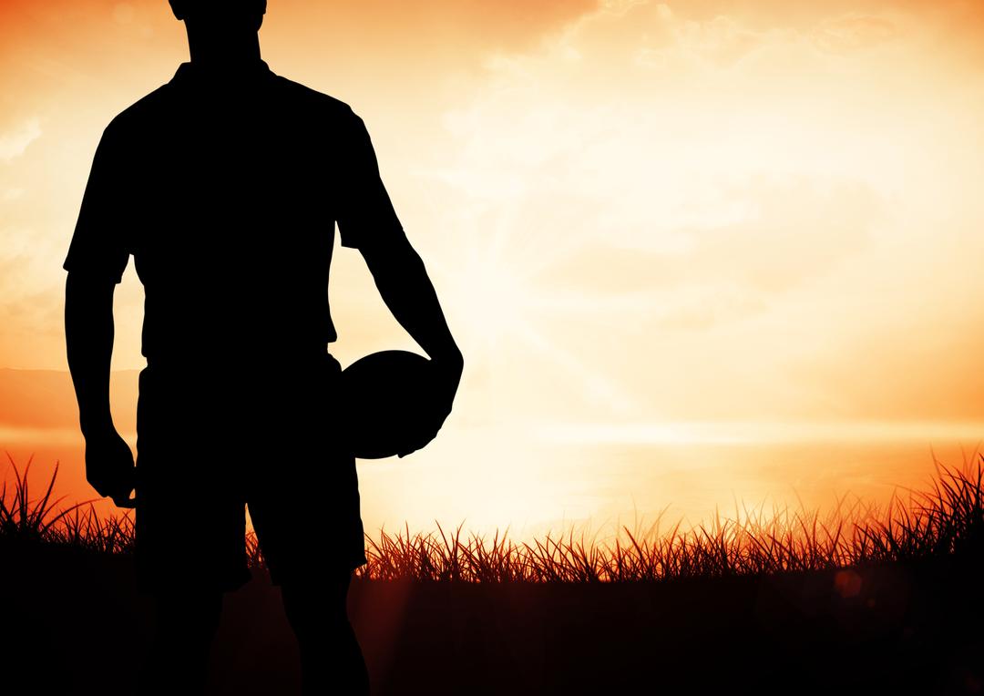 Silhouette of player holding rugby ball against sunset in background - Free Images, Stock Photos and Pictures on Pikwizard.com