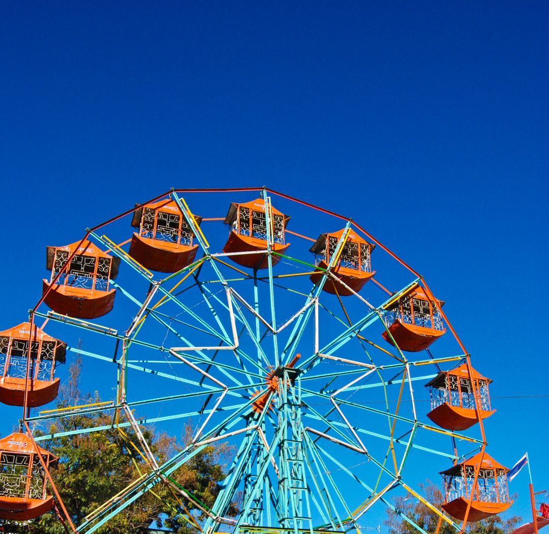 the ferris wheel in blue sky - Free Images, Stock Photos and Pictures on Pikwizard.com