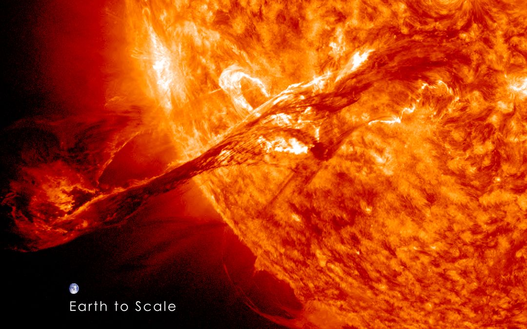 Magnificent CME Erupts on the Sun with Earth to Scale - Free Images, Stock Photos and Pictures on Pikwizard.com