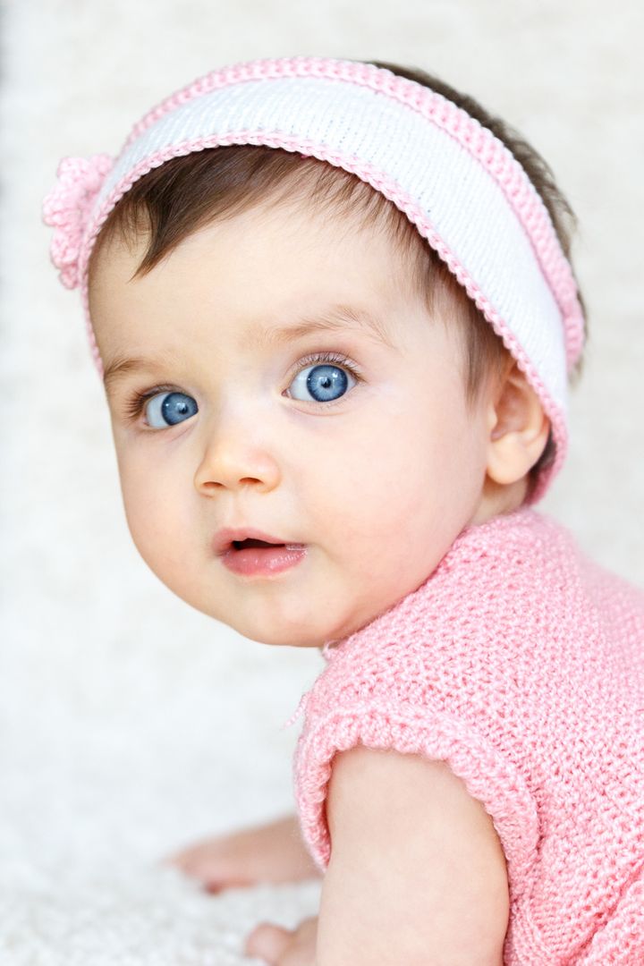 a baby girl with blue eyes - Free Images, Stock Photos and Pictures on Pikwizard.com