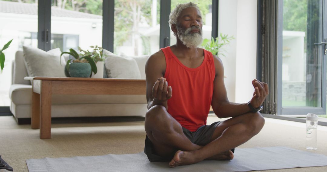 Image of african american senior man meditating - Free Images, Stock Photos and Pictures on Pikwizard.com
