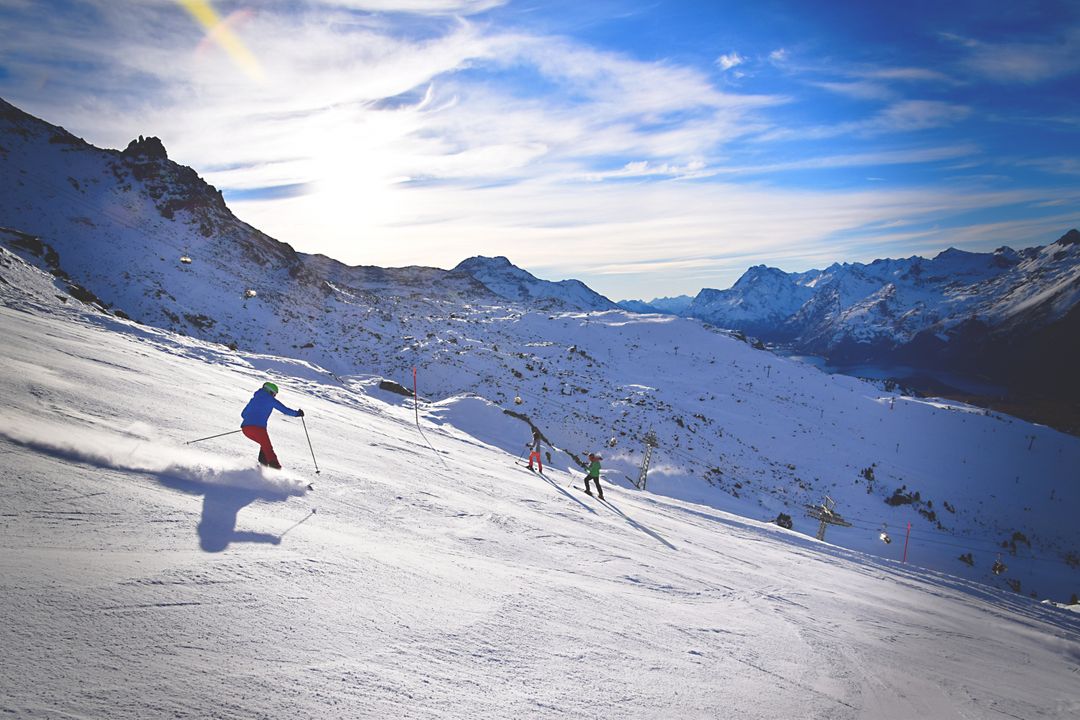a person skiing down a mountain - Free Images, Stock Photos and Pictures on Pikwizard.com