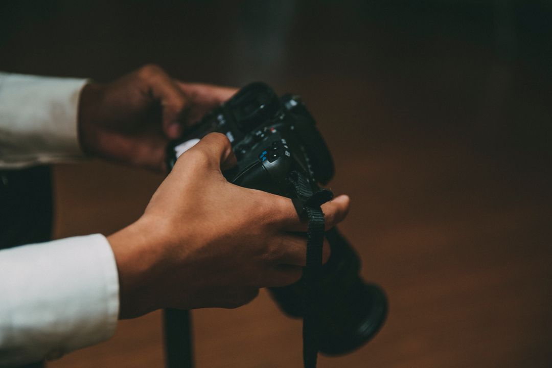 Image of a man holding a camera