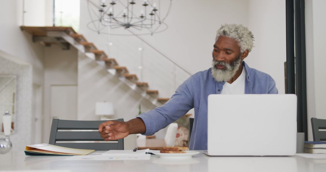 Image of african american senior man using laptop - Free Images, Stock Photos and Pictures on Pikwizard.com