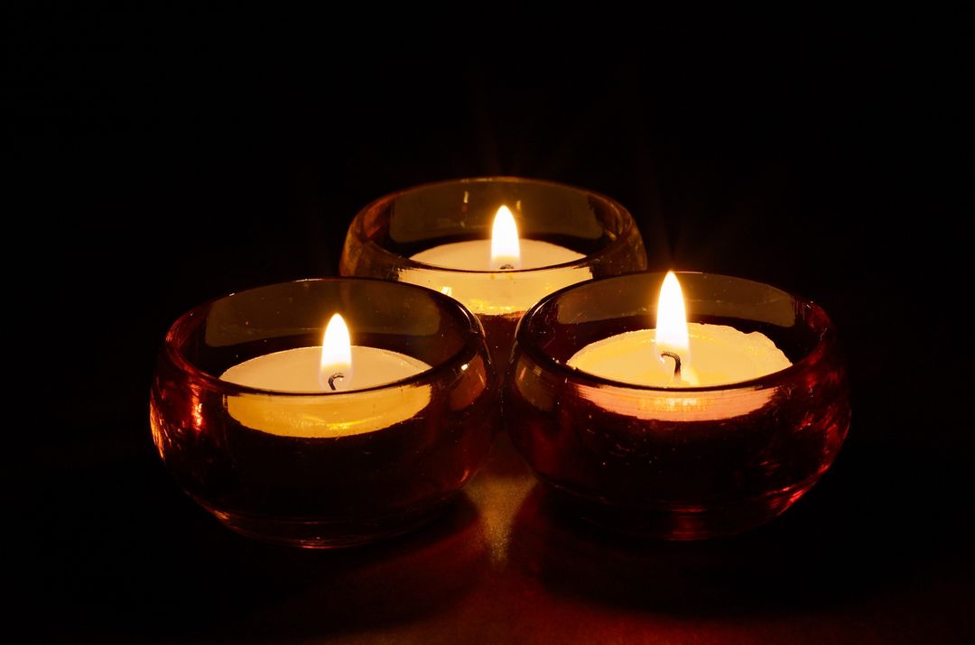 three lit candles - Free Images, Stock Photos and Pictures on Pikwizard.com