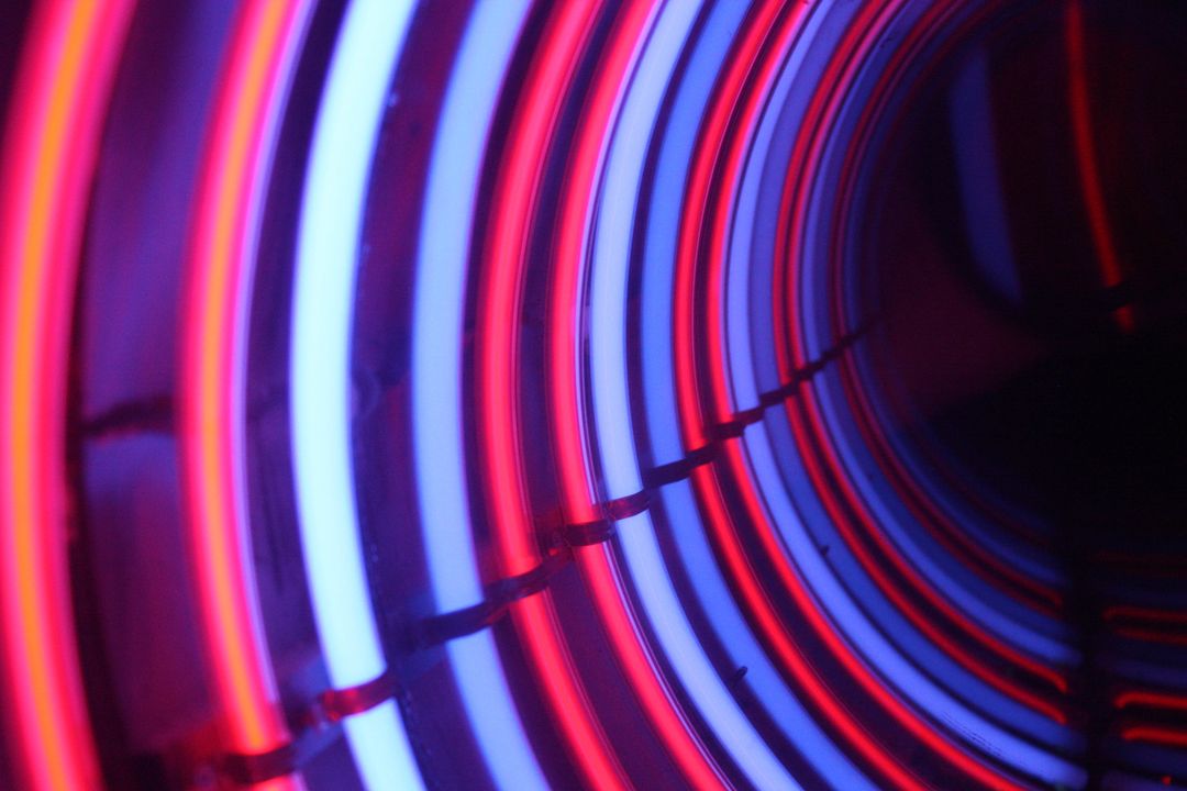 Image of circular neon colored lights - Tips on how to combine colors in your graphic designs - Image