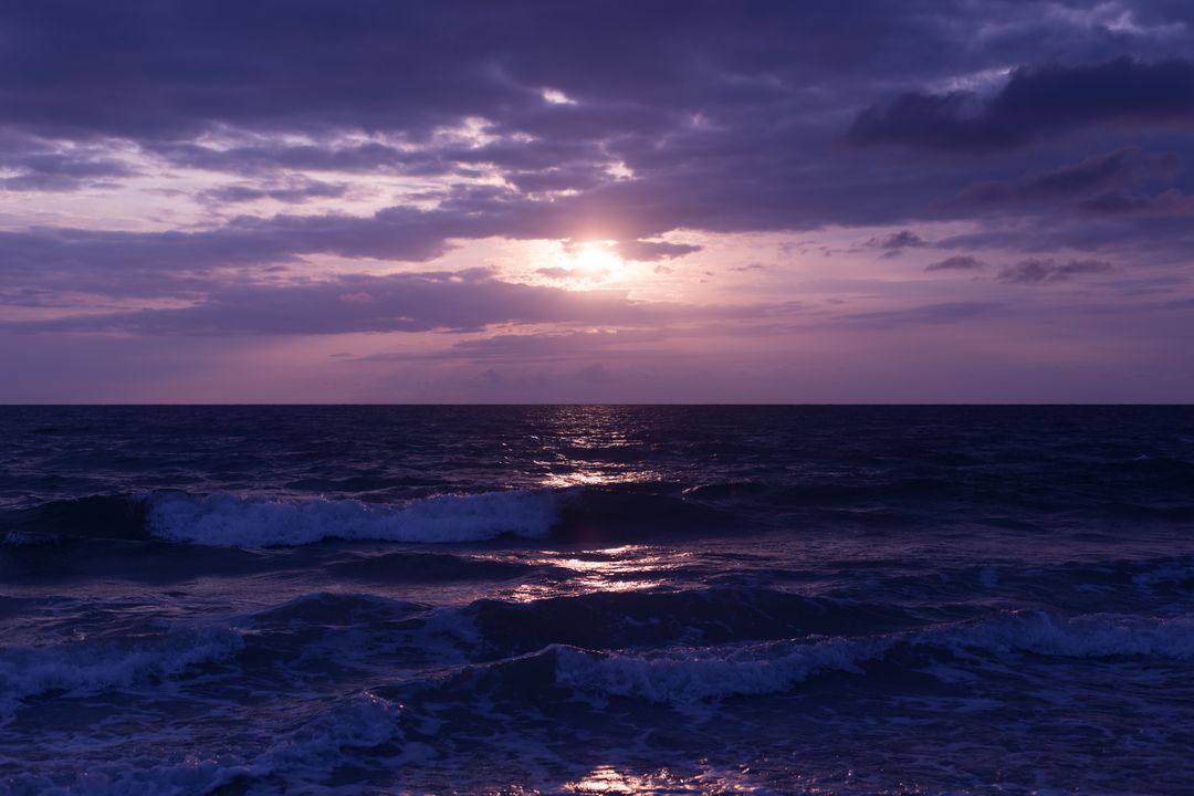 Photo of Blue Ocean and Dark Clouds during Sunset - Free Images, Stock Photos and Pictures on Pikwizard.com