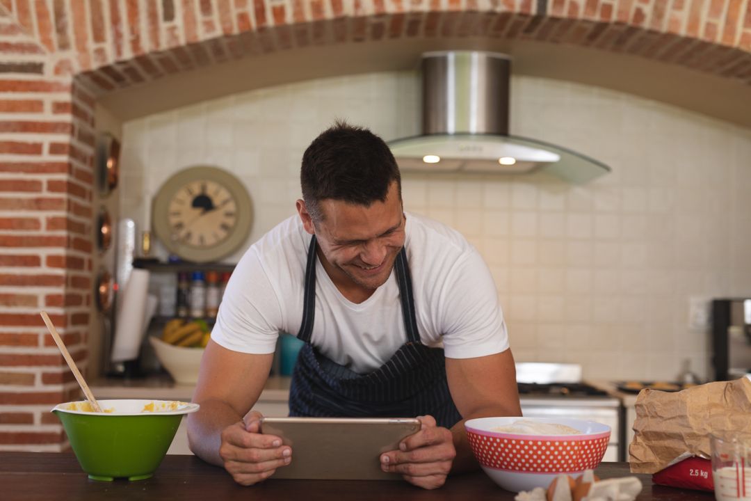 Funny Cooking. Attractive Caucasian Man In The Kitchen Stock Photo, Picture  and Royalty Free Image. Image 65857067.