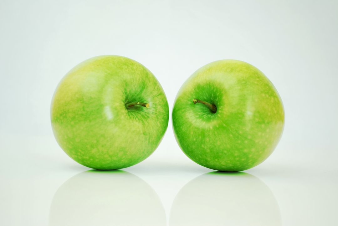 two green apples - Free Images, Stock Photos and Pictures on Pikwizard.com
