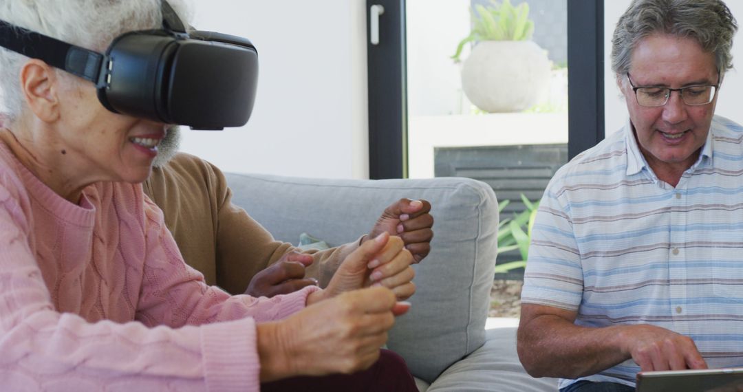 Happy senior diverse people using vr headsets at retirement home - Free Images, Stock Photos and Pictures on Pikwizard.com