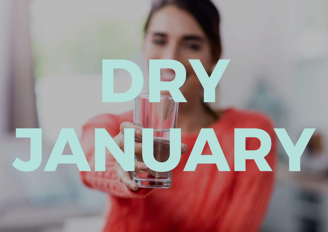 Composition of dry january text with woman holding empty glass in background, copy space - Free Images, Stock Photos and Pictures on Pikwizard.com