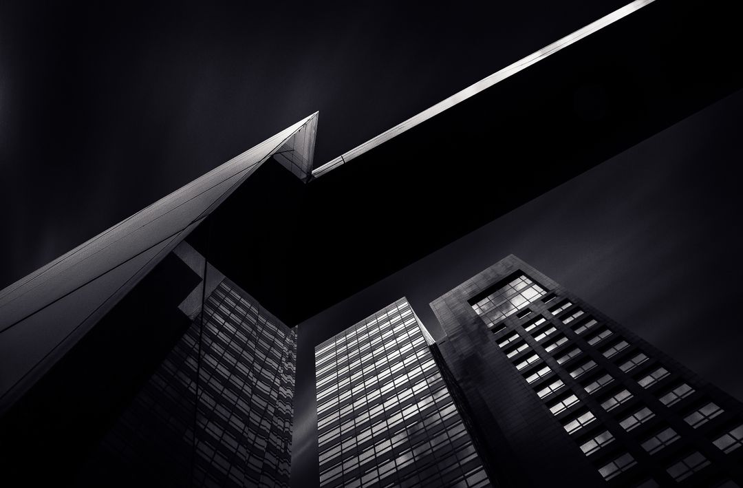 a black and white photo of tall buildings - Free Images, Stock Photos and Pictures on Pikwizard.com
