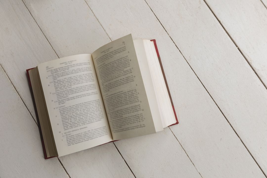 Image of an Open Book on a Table