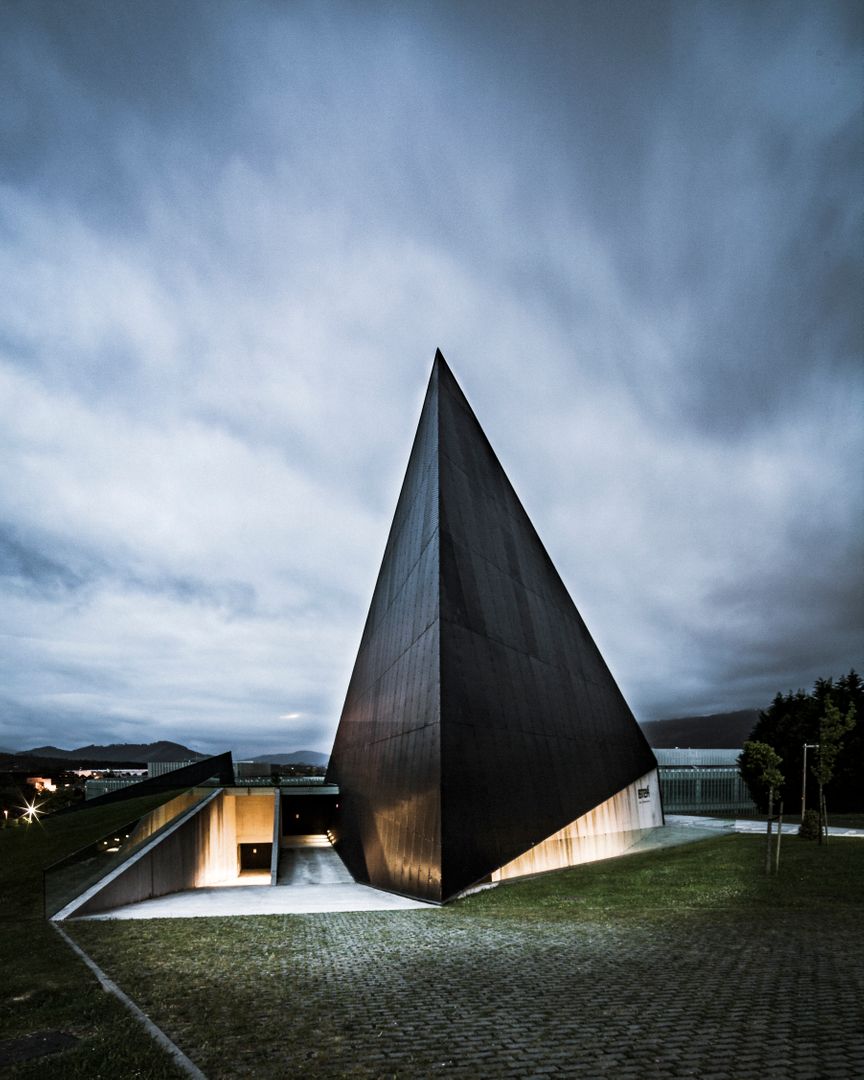 a black building with a triangular shape - Free Images, Stock Photos and Pictures on Pikwizard.com