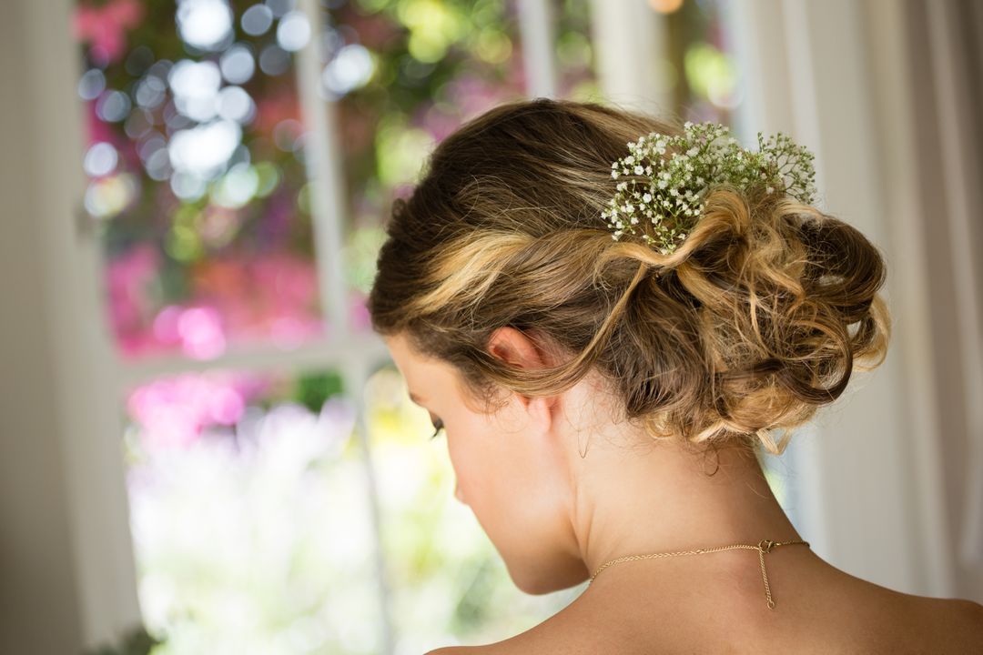 Fashion photo of a bride with her hair styled in a bun