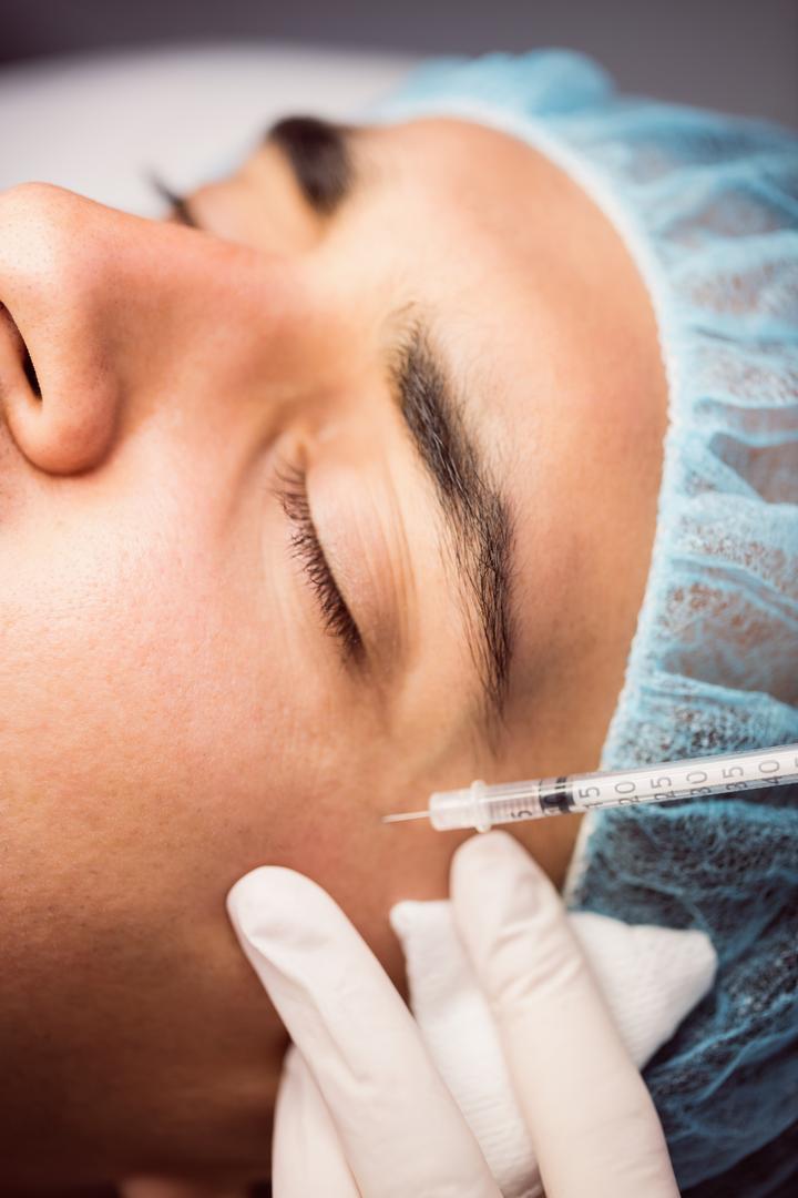 Man receiving botox injection on his face - Free Images, Stock Photos and Pictures on Pikwizard.com
