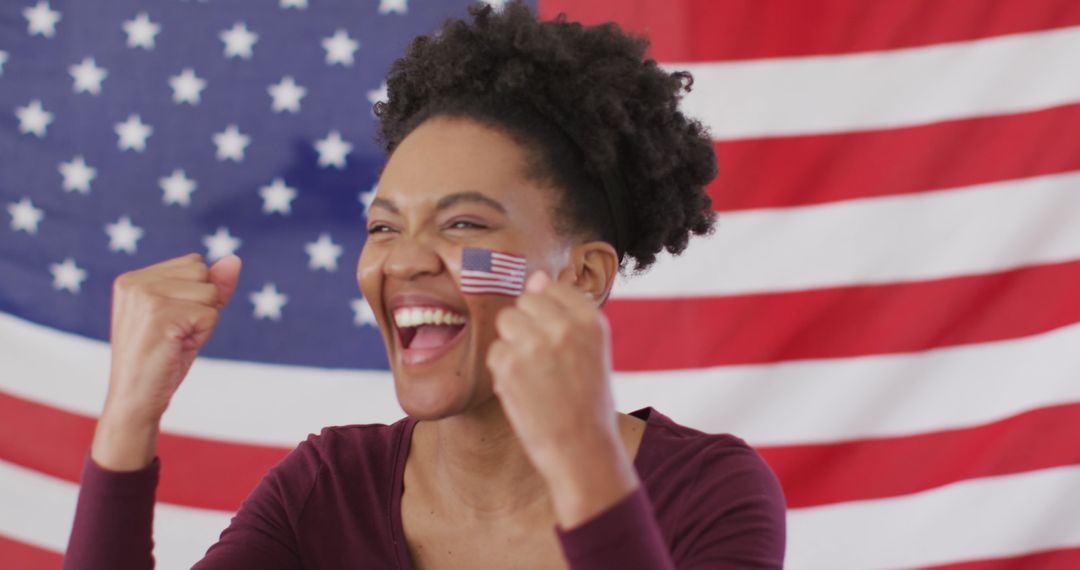 Image of excited afrcian american woman with flag of usa watching match in tv - Free Images, Stock Photos and Pictures on Pikwizard.com
